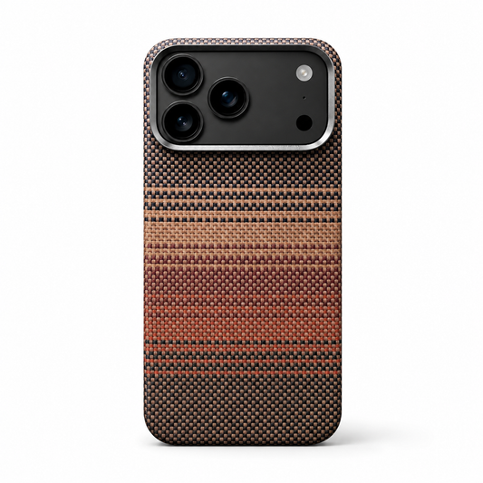 A woven-looking case stands on white, patterned in narrow black, tan, gold and orange horizontal bands beneath a silver-gray camera border.