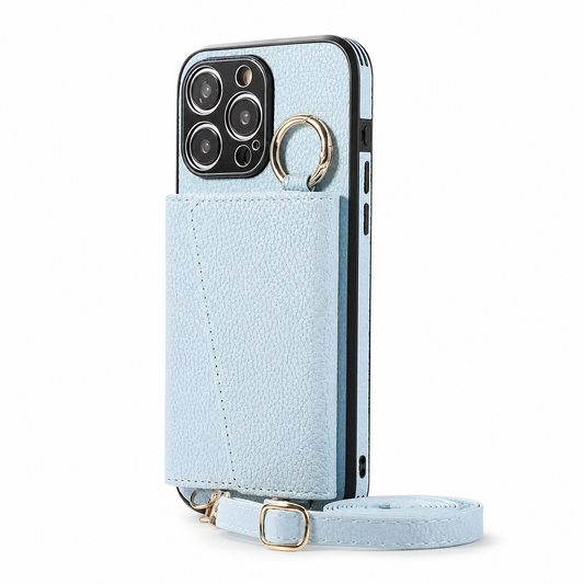 A pale blue pebbled phone wallet stands upright on white, with a rectangular stitched card compartment covering most of its back. A round gold clasp sits beside the camera opening. A matching adjustable strap lies coiled at the base, with gold clips and a small buckle visible.
