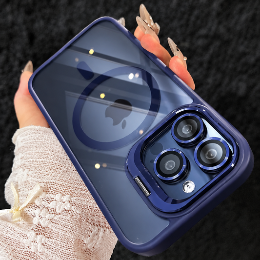 A hand in a lace sleeve holds a navy clear-backed phone case upside down over black fabric. A circular back ring and glossy raised camera surround match its blue border.