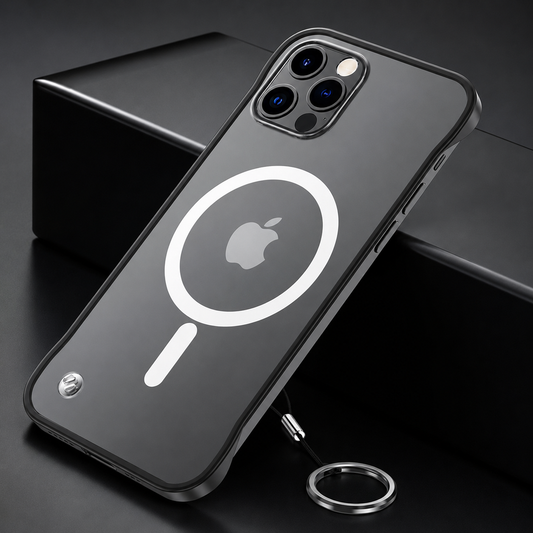 Gray phone in a black-edged clear magnetic case leans against a black block. Its white ring surrounds the Apple logo, with a tethered silver-colored finger ring resting below.