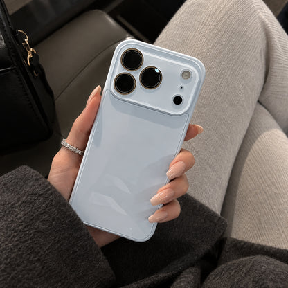 Image showing glossy Blue Phone in Cozy Lounge, featuring iphone slim shockproof case with tempered glass back & camera protection.