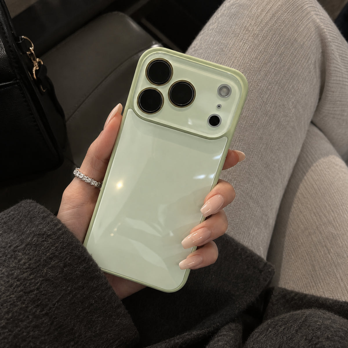 Image showing glossy Mint Phone in Cozy Layers, featuring iphone slim shockproof case with tempered glass back & camera protection.