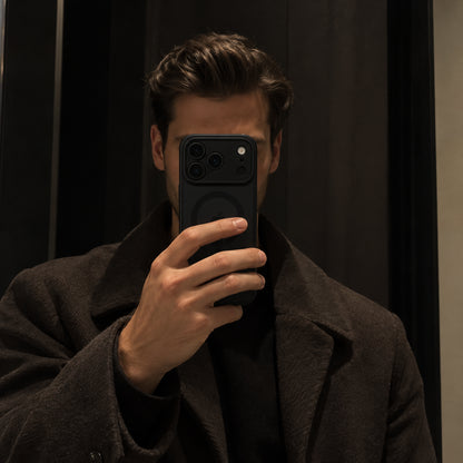 Image showing moody Mirror Selfieina Dark Coat, featuring iphone matte translucent magsafe case with anti-fingerprint & scratch protection.
