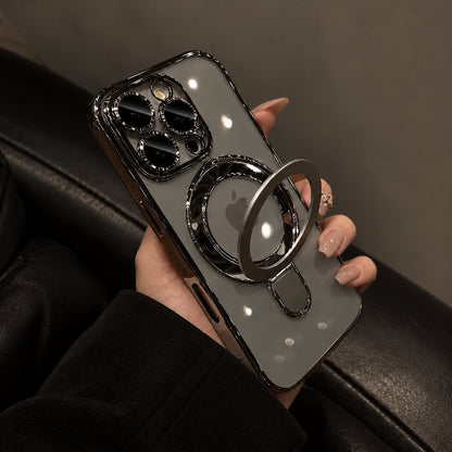 A hand holding a smartphone case with a large circular ring stand and a metallic camera border, shown against a dark leather seat background.