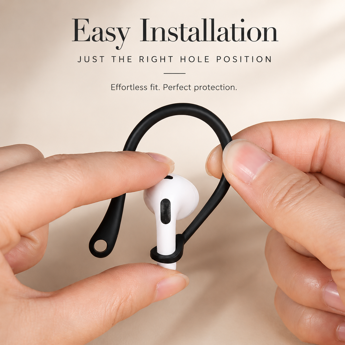 Hands demonstrate fitting a black ear hook onto a white stemmed earbud. One hand steadies the earbud while the other holds the curved loop, positioning the small lower collar around the stem. Text describes easy installation.