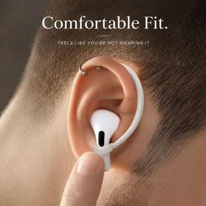 Close-up side view of an ear wearing a white stemmed earbud secured by a white hook. The curved hook follows the outer edge of the ear, and a fingertip touches the earbud's lower stem while adjusting the fit.