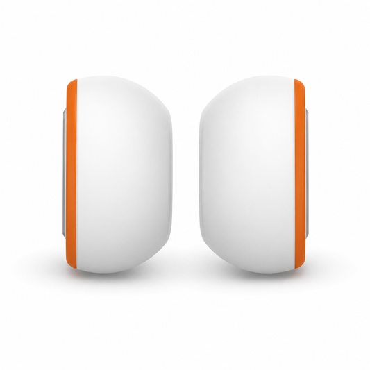 Pair of white rounded replacement ear tips shown side-on, with orange foam rings along their flat attachment edges.
