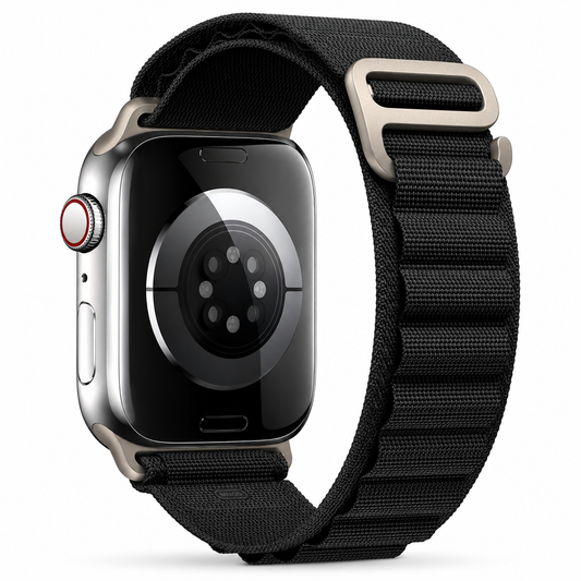 Rear view of an Apple Watch fitted with a black woven fabric loop band. Raised rows of stitched loops run along the strap, secured by a metallic-colored hook.