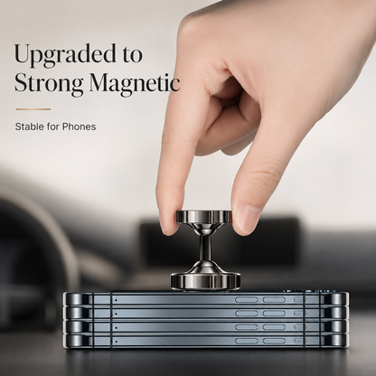 A hand lifts a small silver-colored mount above a stacked group of phones. Text advertises an upgraded magnetic hold.
