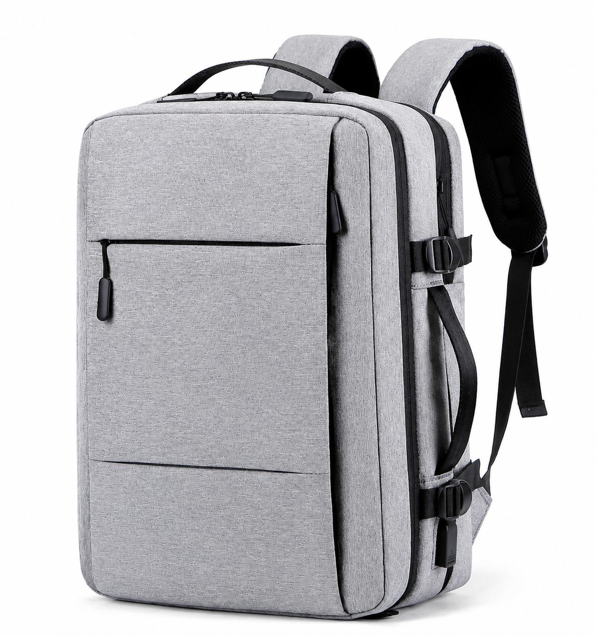 A light gray rectangular backpack stands at an angle with padded straps, top handle, front zipper pocket, side carry handle and black compression buckles.