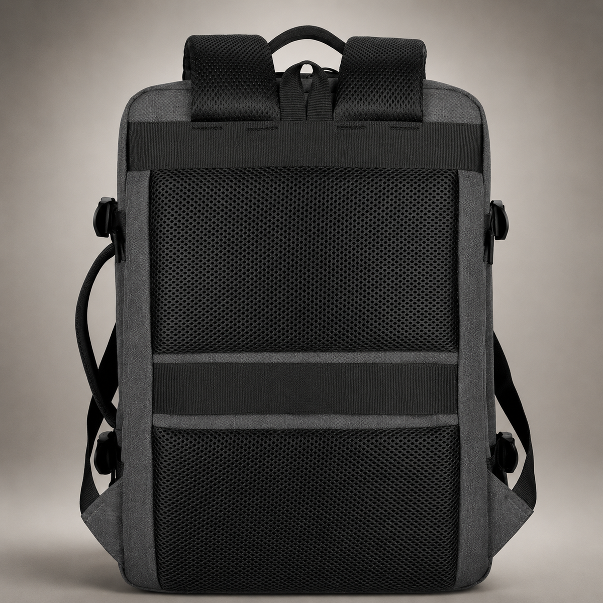 The rear of a charcoal backpack shows broad black mesh padding, padded shoulder straps, top handle and horizontal luggage strap.