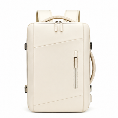 A cream rectangular backpack faces forward, showing diagonal front seams, a narrow vertical zip pocket, double main zipper, woven top and side handles and padded shoulder straps.