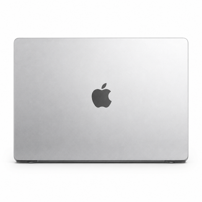 A closed MacBook is shown from behind in a pale silver or clear fitted cover, with a dark Apple logo centered on the lid.
