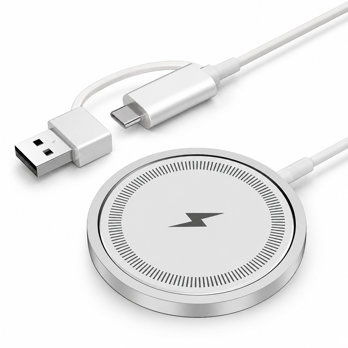 A silver-colored circular charging puck with a black lightning symbol and fine striped ring appears beside its white USB-C cable and USB-A adapter.