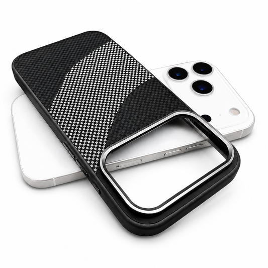 An empty black phone case lies diagonally across a white phone against white. Its back has curved bands of black and silver carbon-fiber-style checks and a large rectangular camera opening with silver-colored trim.