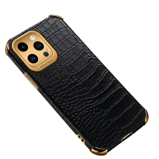 Black crocodile-pattern phone case shown diagonally against white, with gold-colored corner caps, side buttons and a square camera guard.