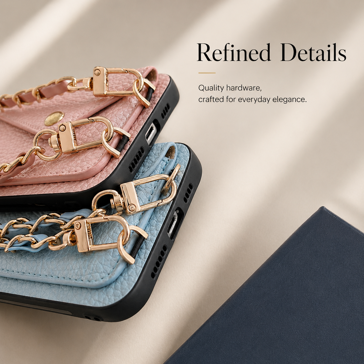 Close-up of pink and blue phone wallets' lower edges shows gold-colored detachable clasps, strap rings, charging-port openings, and speaker holes.
