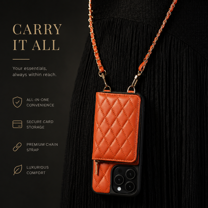 An orange quilted wallet phone case hangs upside down against black clothing from a matching woven chain. “Carry It All” text advertises card storage and carrying convenience.