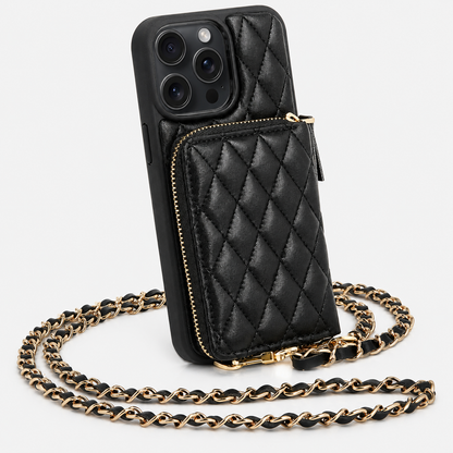 A black diamond-quilted wallet phone case stands against white, with a rectangular rear pouch edged by a gold-colored zipper and a long matching woven chain strap.