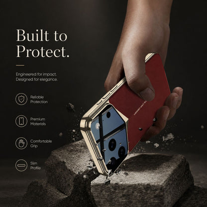 A hand holds a burgundy-and-gold case camera-corner-first against a rough block, with small fragments nearby. Text advertises impact protection.
