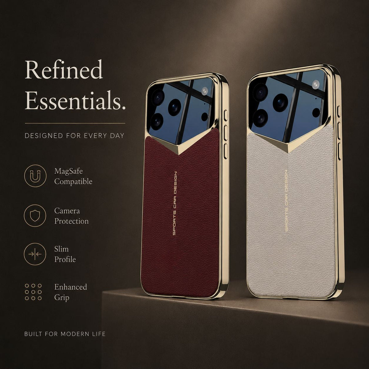 Burgundy and beige cases stand on a dark stepped platform. Their gold-colored V-shaped camera borders and textured backs face forward.