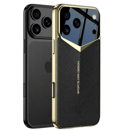 A dark phone stands beside a black textured case with gold-colored edges. A glossy angular camera panel narrows into a gold V above small vertical lettering on the back.