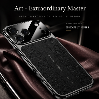 A black embossed case lies diagonally on red satin, showing its curled motifs, narrow central strip and glossy camera panel.