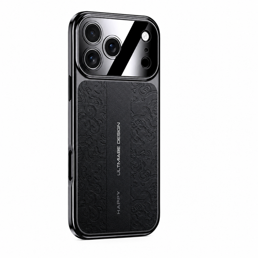 A black phone case stands on white with embossed curling floral patterns along both sides of its back. A plain center strip carries lettering below a reflective three-lens camera panel.