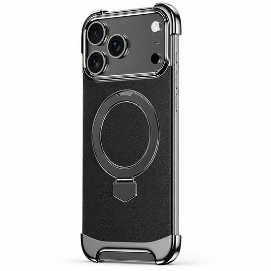 A black textured phone case stands on white with silver-colored corner bumpers and a large circular ring folded flat on the back below a broad camera panel.