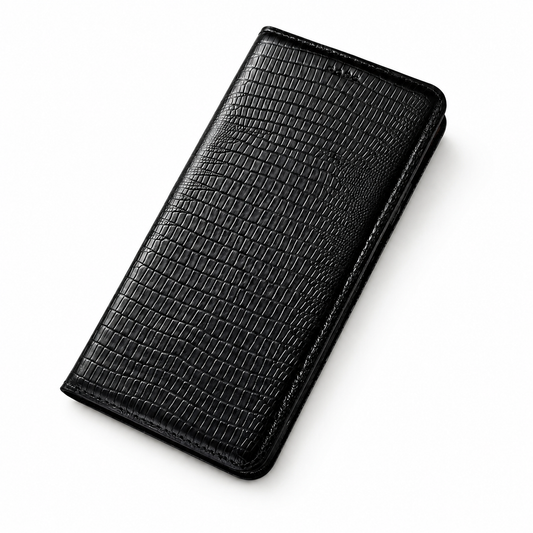 A closed black folio case lies diagonally on white, showing a fine reptile-like scale pattern and stitched edges.