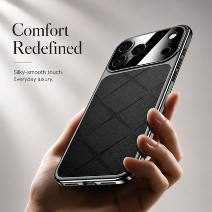 A hand holds a black diamond-pattern case at an angle, showing its reflective border and broad glossy camera panel.