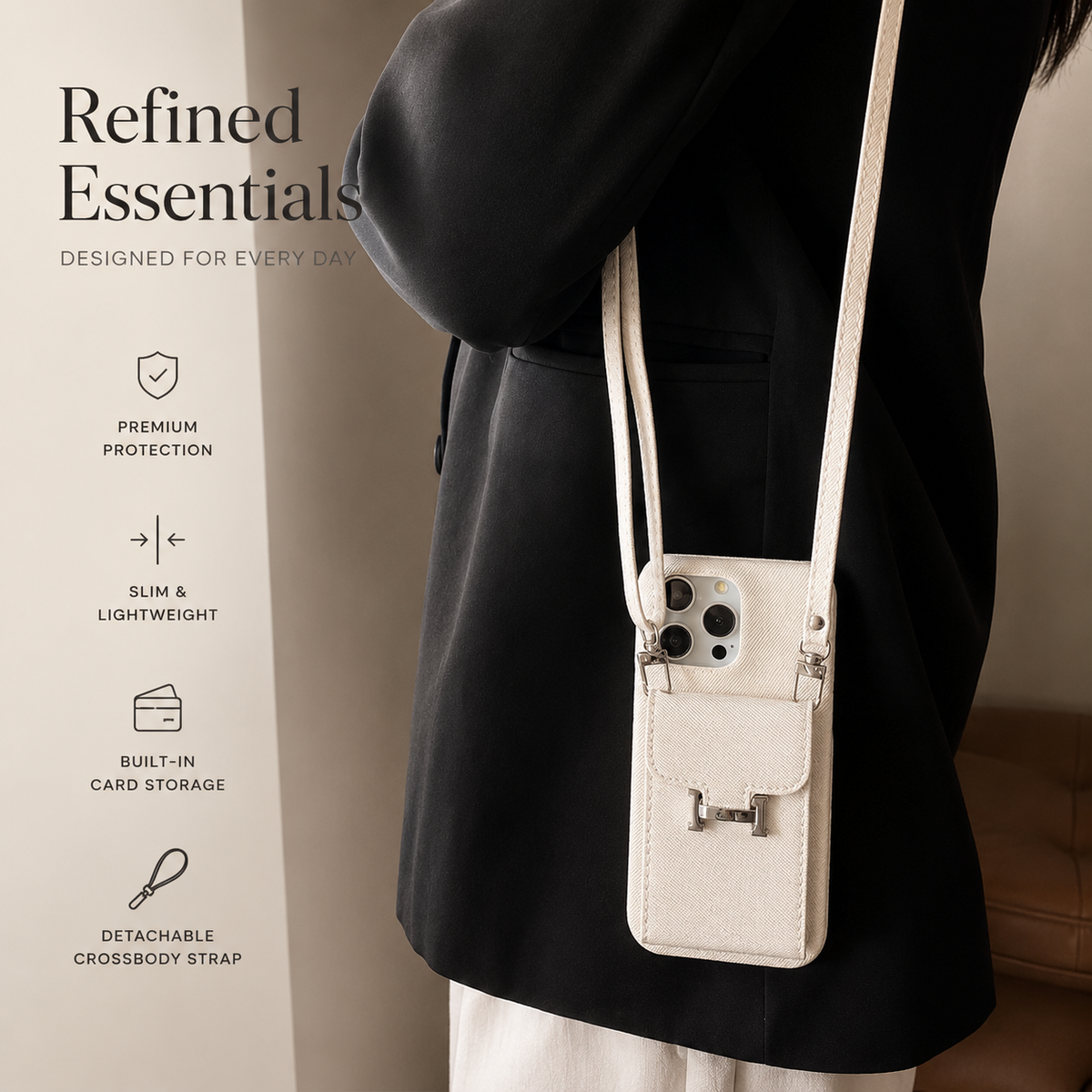 A person in a black coat wears a cream pocket case on a long matching strap. Its rear flap pocket and silver clasp face outward.