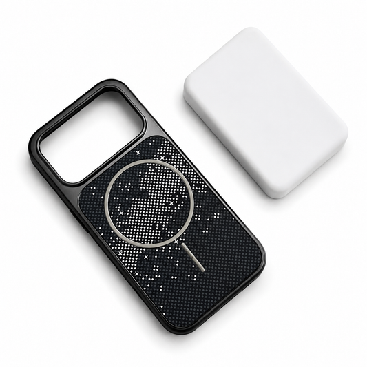 An empty black patterned case lies diagonally beside a white rectangular block. Its back has a fine dotted texture, scattered light marks and a metallic magnetic circle with a short alignment bar.