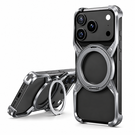 Two black phones wear silver-colored open-frame cases with circular rings and corner bumpers. One stands upright; the other rests horizontally with its ring extended as a stand.