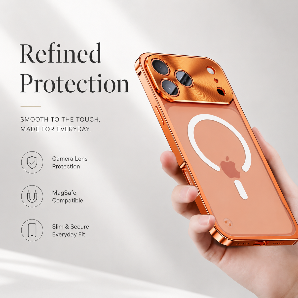 Hand holds an orange-framed phone upright on beige, showing a white magnetic ring on its frosted back and broad camera panel. Text highlights lens protection and a slim fit.