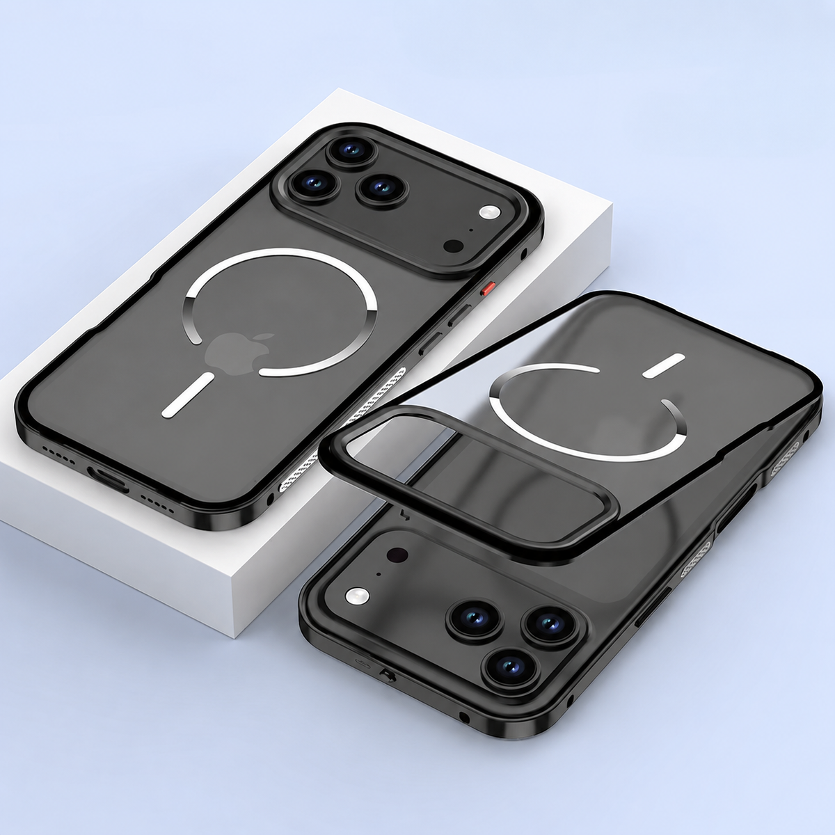 A black phone case lies on a white block against pale blue, beside a separated translucent back panel and phone. White circular magnetic markings appear on the backs.