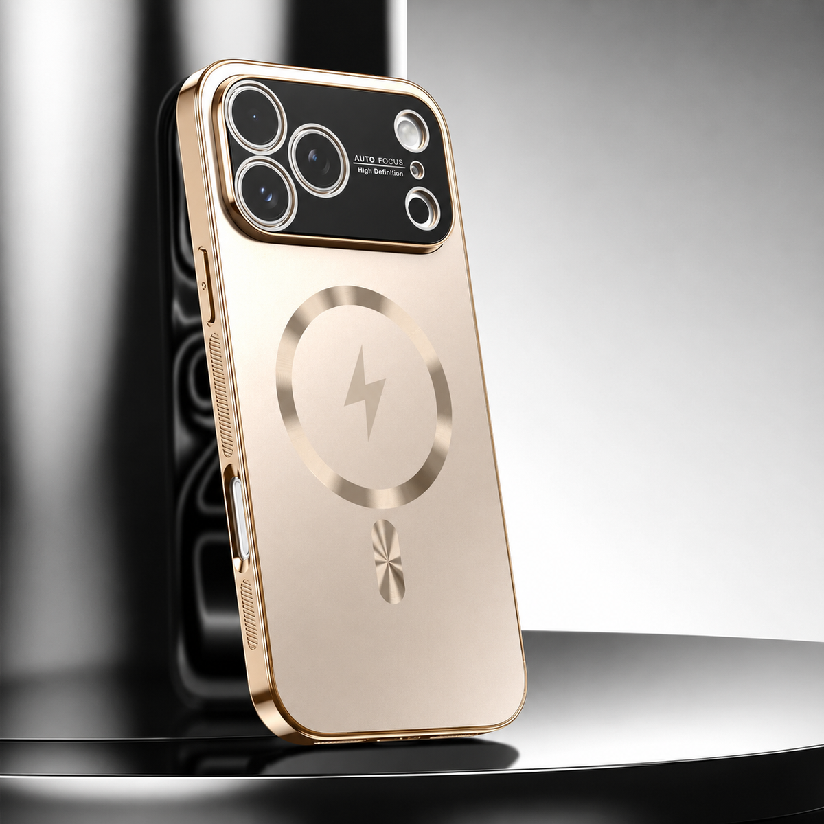 A champagne-colored metallic-looking phone case leans upright on a glossy black pedestal. A circular ring surrounds a lightning symbol beneath a broad black camera panel with silver-colored lens rings.