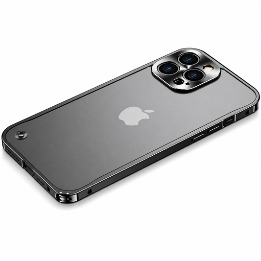 A dark gray phone lies diagonally on white inside a shiny flat frame. Its Apple logo remains visible through the frosted-looking back, with a raised camera border and small circular fitting near a lower corner.
