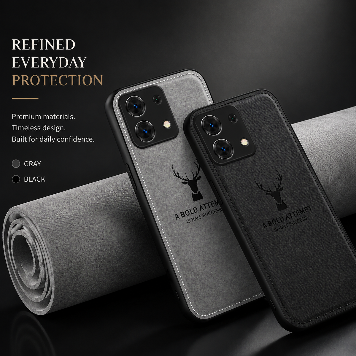 Gray and black fabric-textured phone cases lean against a rolled sheet of gray material. Each carries a stag head and motivational words. Text advertises materials, design and everyday protection.