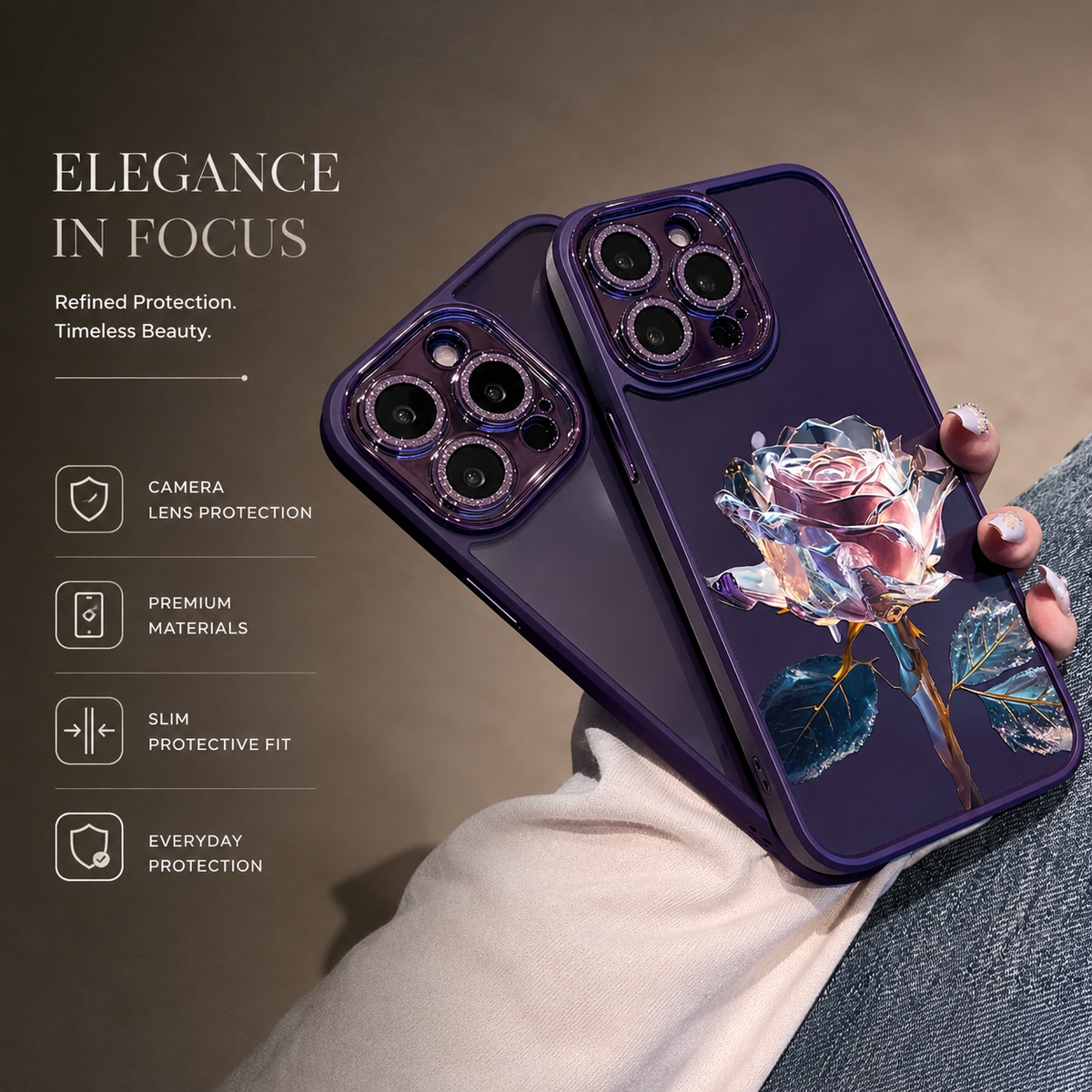 A hand holds a glossy purple rose-decorated phone case beside an empty matching transparent shell, near blue jeans. The installed case has a faceted pale pink rose with blue-green leaves, while the separate shell shows its camera openings and purple rim. Text reads Elegance in Focus.