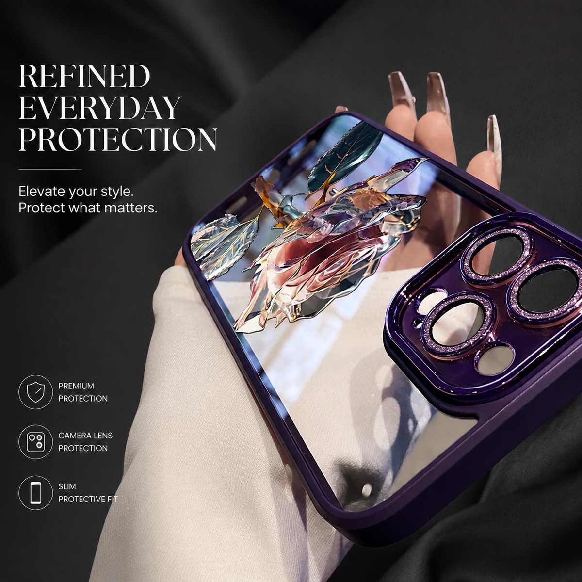 A hand holds a reflective purple case at an angle, showing a faceted pale rose, leaves and decorated camera surround beneath Refined Everyday Protection.