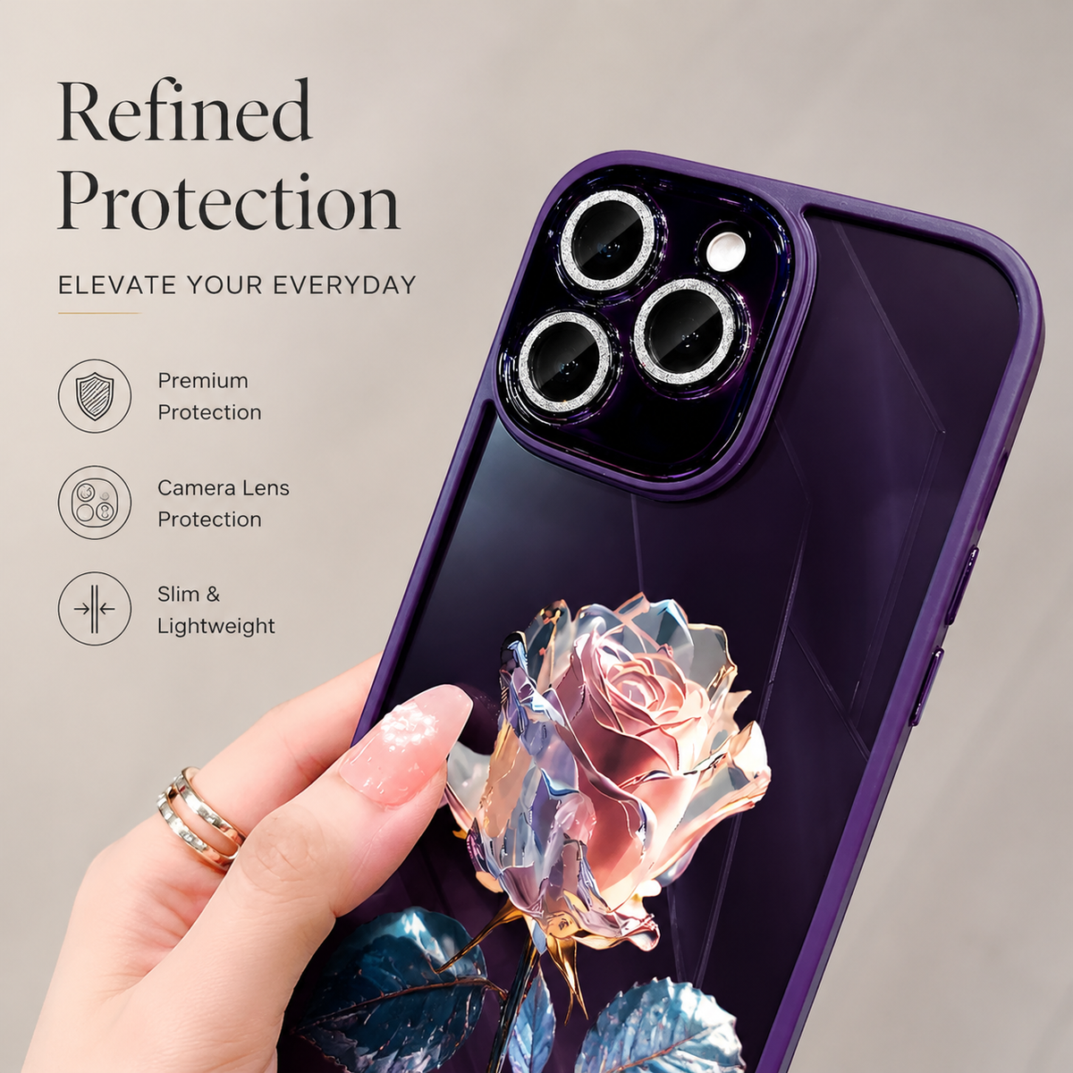 A hand holds a purple rose-decorated case close to the camera, showing sparkling-looking lens rings and a faceted pale pink flower.