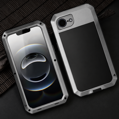 Front and rear views show a silver rugged case lying on dark ribbed fabric. The rear has a single large lens opening, while the front displays pale circular graphics.