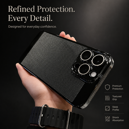 A hand wearing a dark wristwatch holds a black perforated case horizontally, showing its raised camera surround and metallic lens rings.