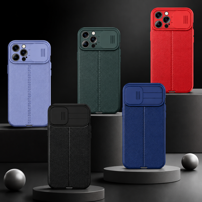 Lavender, green, coral, black and blue sliding-camera-cover cases stand on gray display platforms.