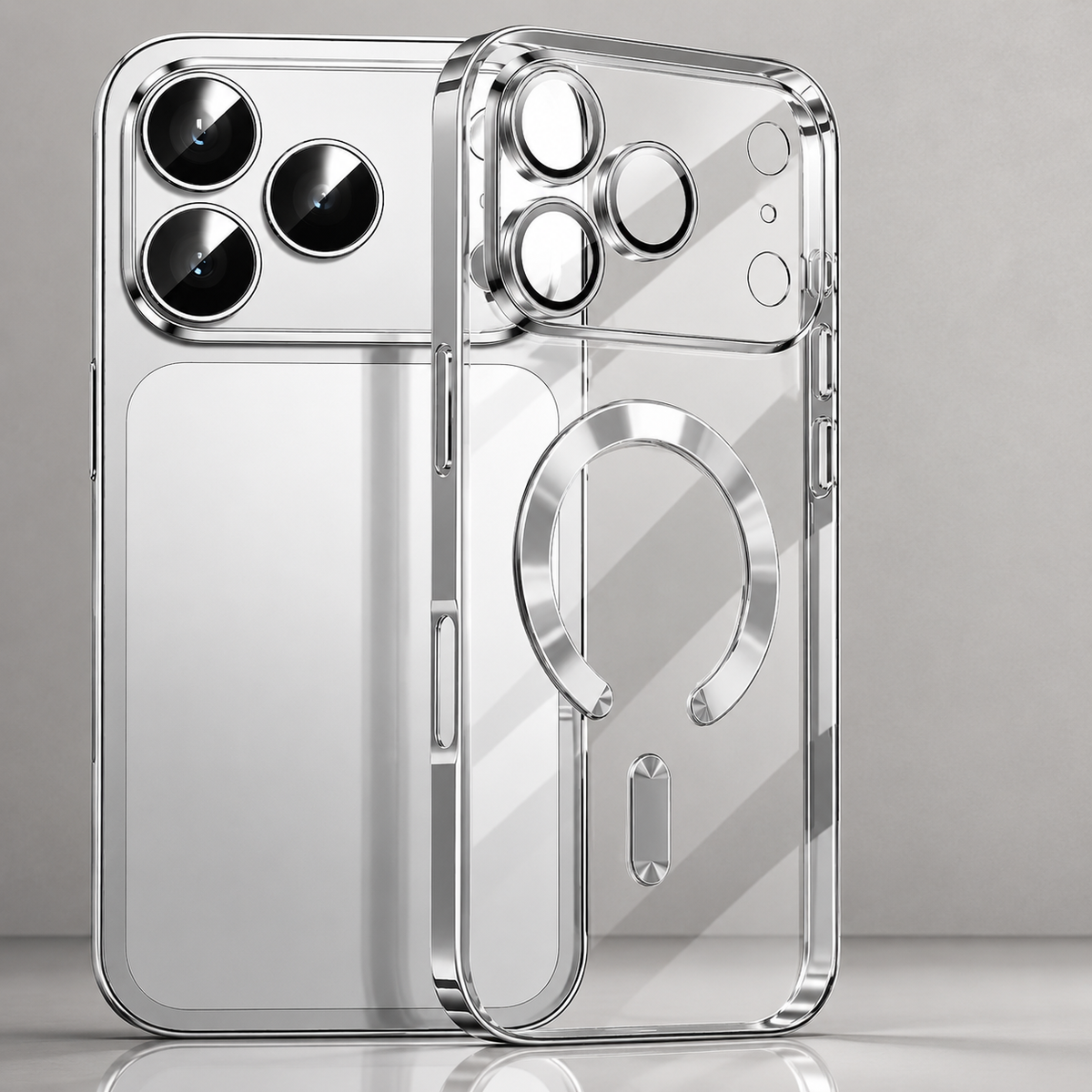 Silver-trimmed clear case standing beside a silver phone, with matching individual camera rims and an open circular back ring.