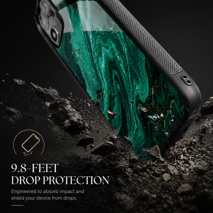 A green marble-pattern case with black textured edges strikes dark rocky ground corner-first. Text advertises 9.8-foot drop protection.