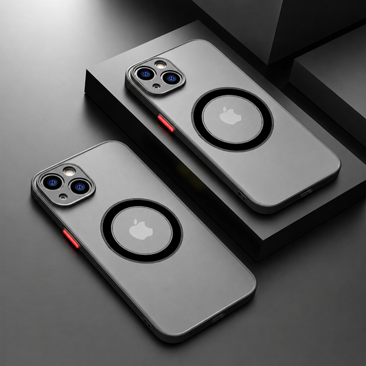 Two gray-backed phone cases with black trim, black magnetic rings and red side buttons lie diagonally on black stepped blocks, showing fitted circular camera openings.