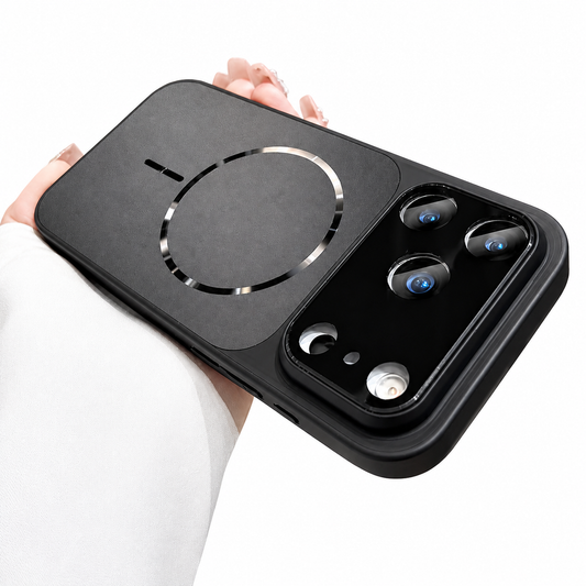 A hand holds a dark gray phone case horizontally against white. A fine matte back panel has a segmented circular ring and bar, beneath a glossy wide panel surrounding three camera lenses.