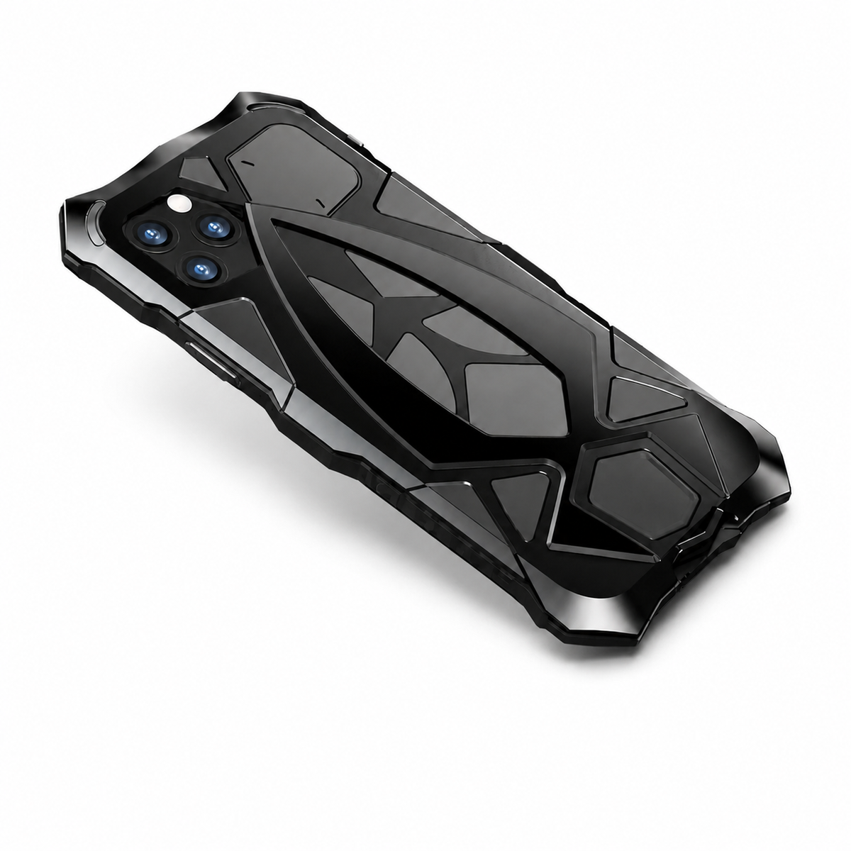 A black angular armor-style case lies diagonally on white, with a raised geometric rear design, open sections and thick corner guards.